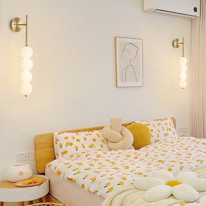 Minimalist Linear Wall Lamp with Four Opal Glass Globes